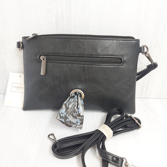 Black clutch bag with wrist strap