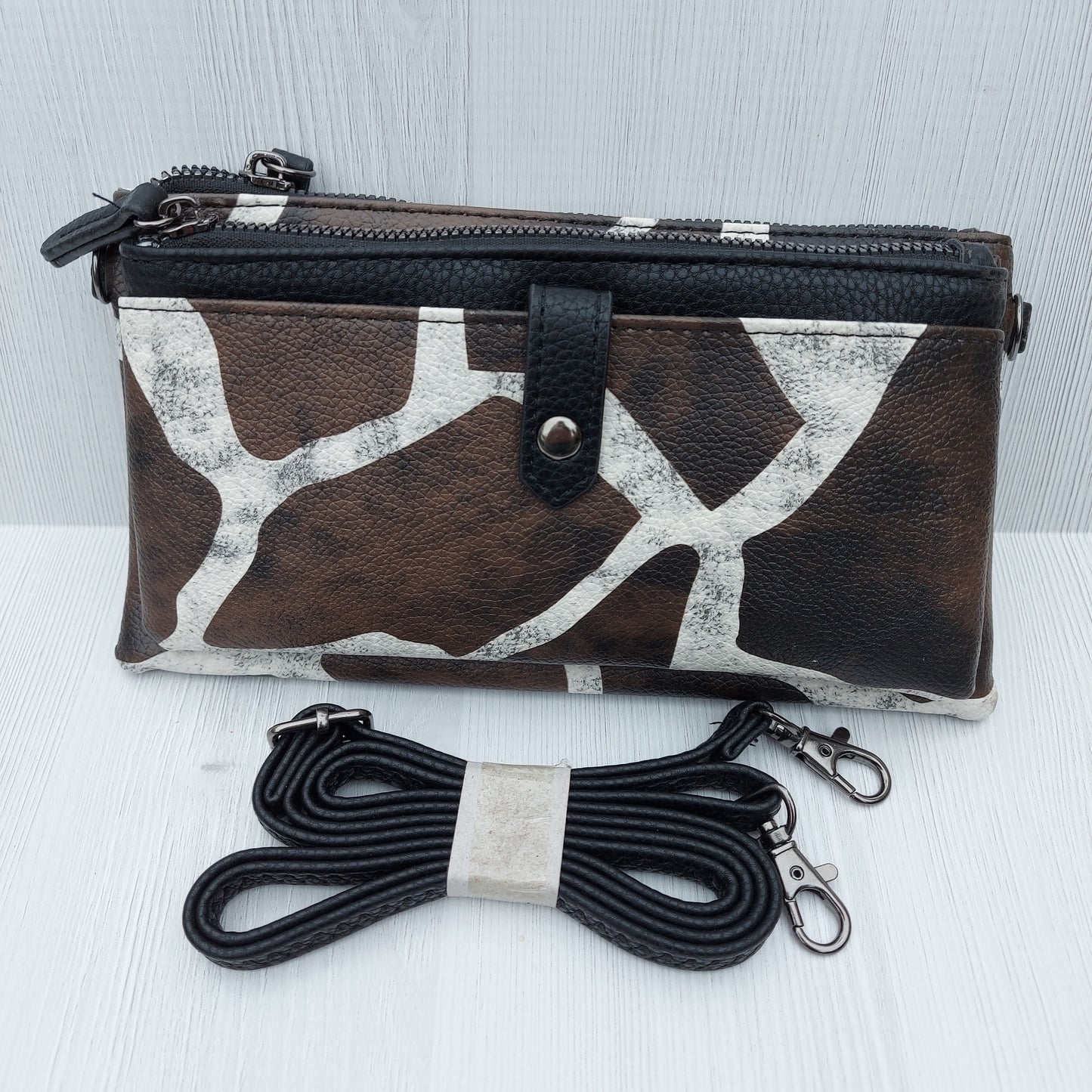 Giraffe print clutch bag