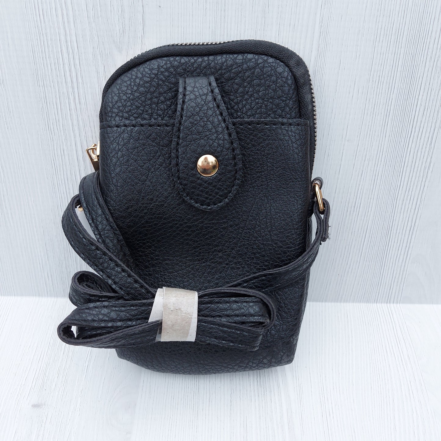 Black faux leather cross body bag